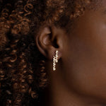 Yellow Gold Earrings with hexagons and V shapes, and Diamonds, Medium - Model shot