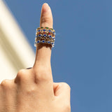 Stack of three White Gold and Blue Sapphire Rings with hexagons and V shapes, Medium - Model shot