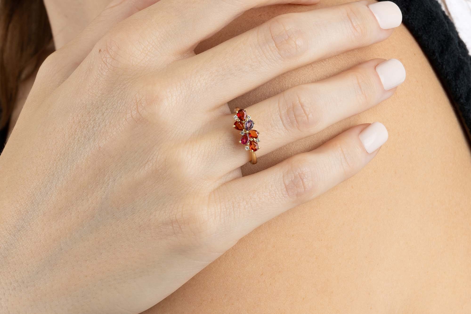 Yellow Gold Ring with pear shaped Orange and Purple Sapphires, and small round Diamonds - Model shot