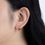 Yellow Gold hoop Earrings with pear shaped Rubellite, and small round Diamonds, Medium - Model shot