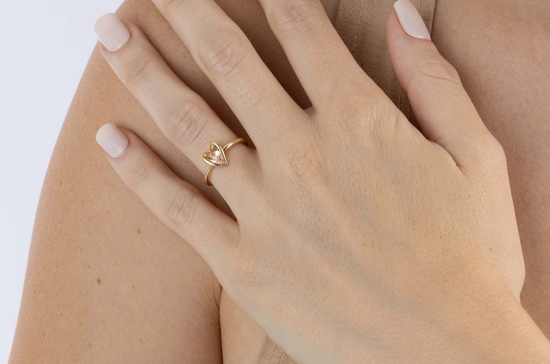 Yellow Gold heart shaped ring with a pear shaped Morganite, Small - Model shot