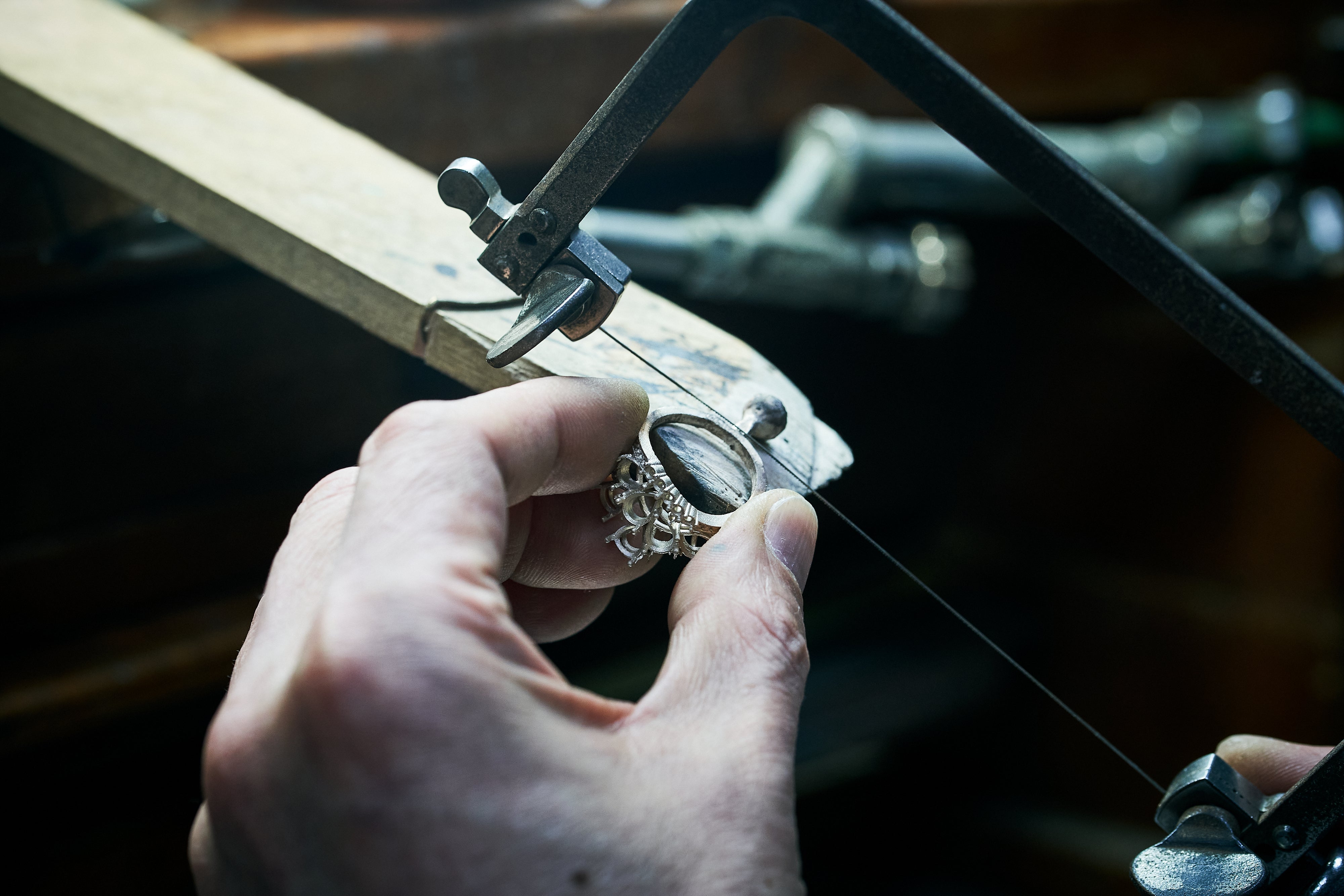 Wire saw being used to shape ring frame